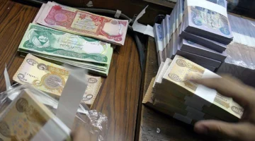 ثبات سعر صرف الدينار العراقي أمام الدولار الأحد